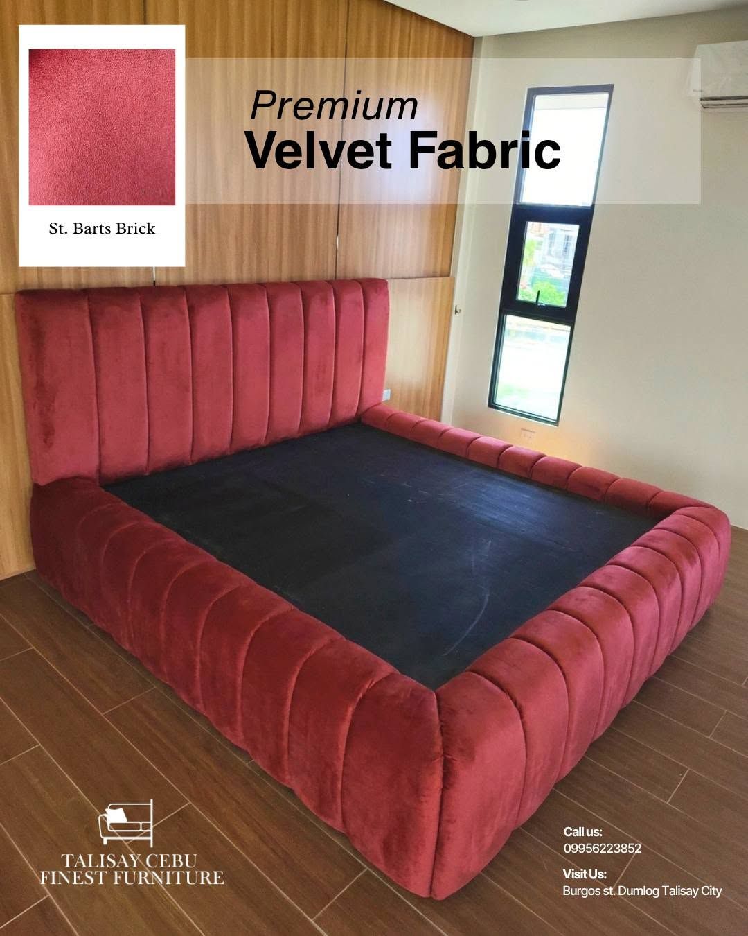 A low-profile, modern bed frame featuring extensive vertical channel tufting along both the high headboard and the thick, wrap-around upholstered borders.