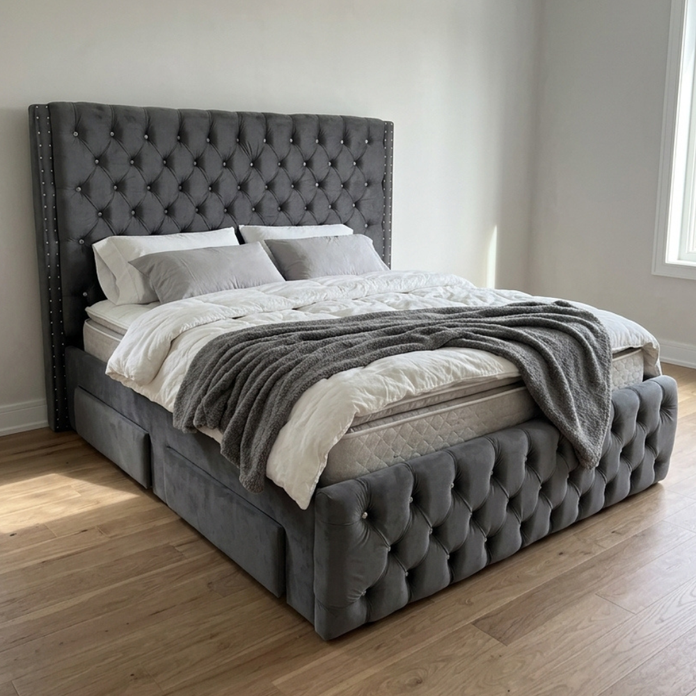 Charcoal gray velvet-style bed with a tall wingback headboard, deep tufting, crystal buttons, and nailhead trim. Four upholstered drawers add storage. Available in various sizes, in fabric or leather.
