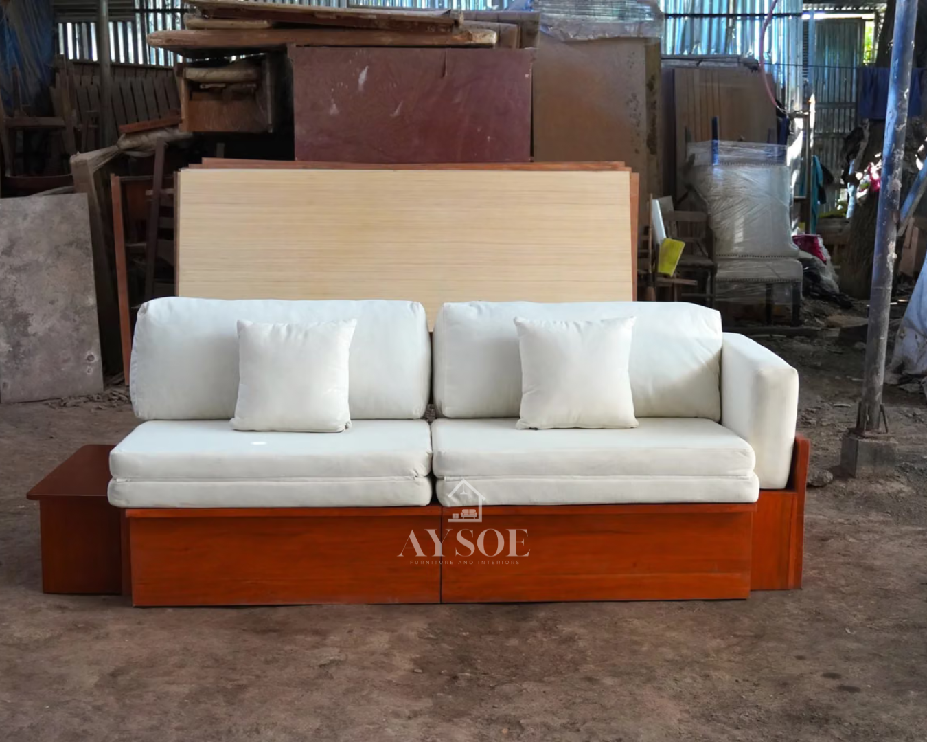 One piece, three ways to use it: a cozy sofa, a roomy L-shape, or a full bed, all in a cream fabric finish with a warm wood frame.