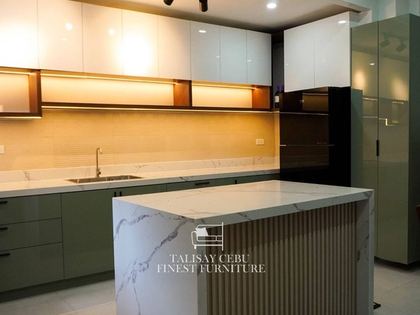 Kitchen setup with yellow lighting