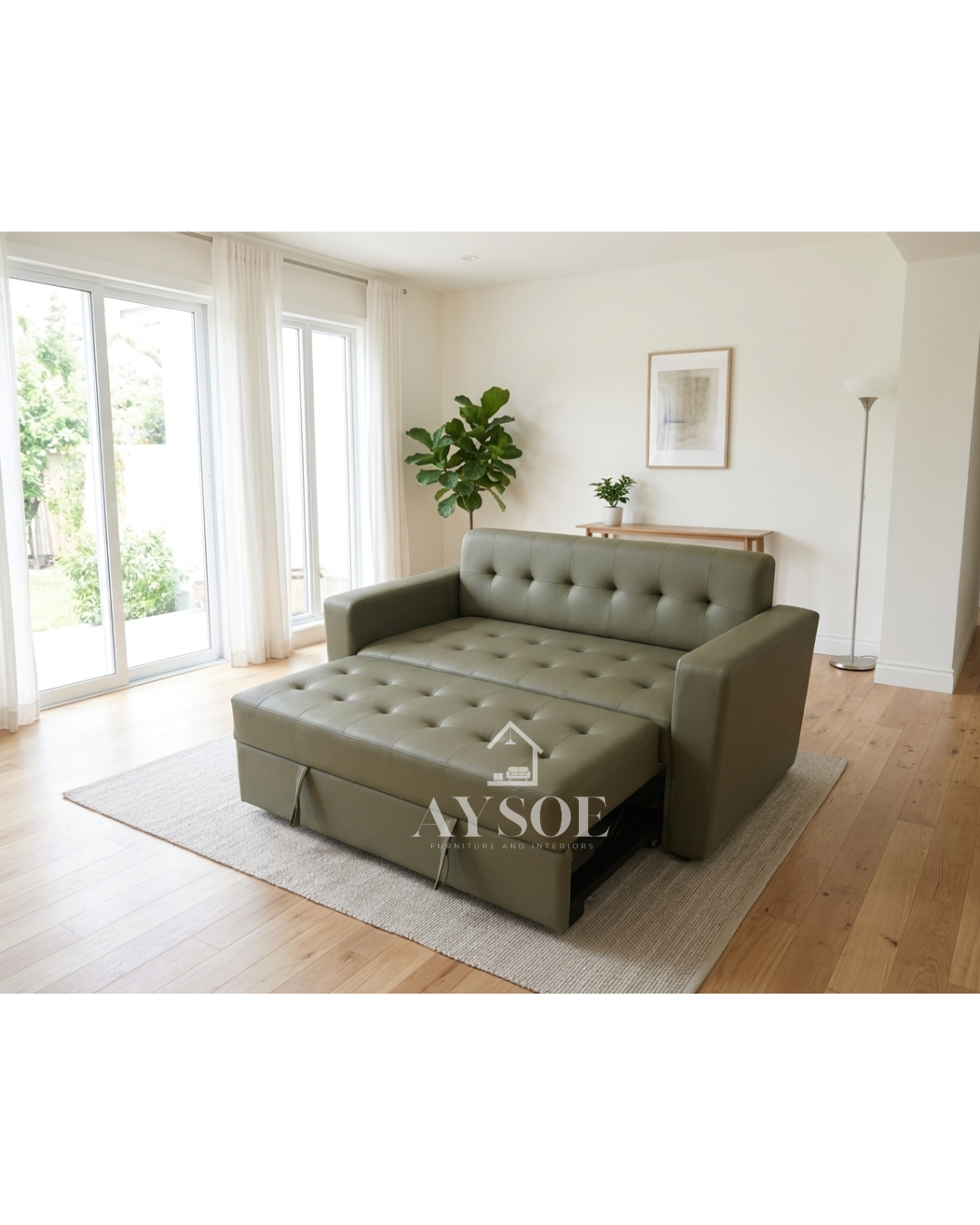 A 2-seater sofa that pulls out into a bed, in sage grey-green leatherette with a button-tufted back and seat. Two pieces of furniture in one, great for small spaces and guests.