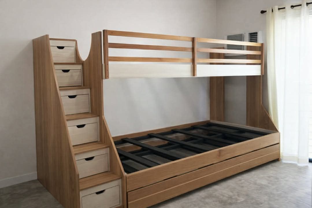 A natural wood bunk bed with a safety-railed top bunk, a wider bottom bed, a staircase with five storage drawers, and a pull-out trundle that sleeps a third. Space-saving and built to last.
