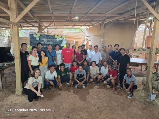 The whole TCFF Team in the shop during their team party