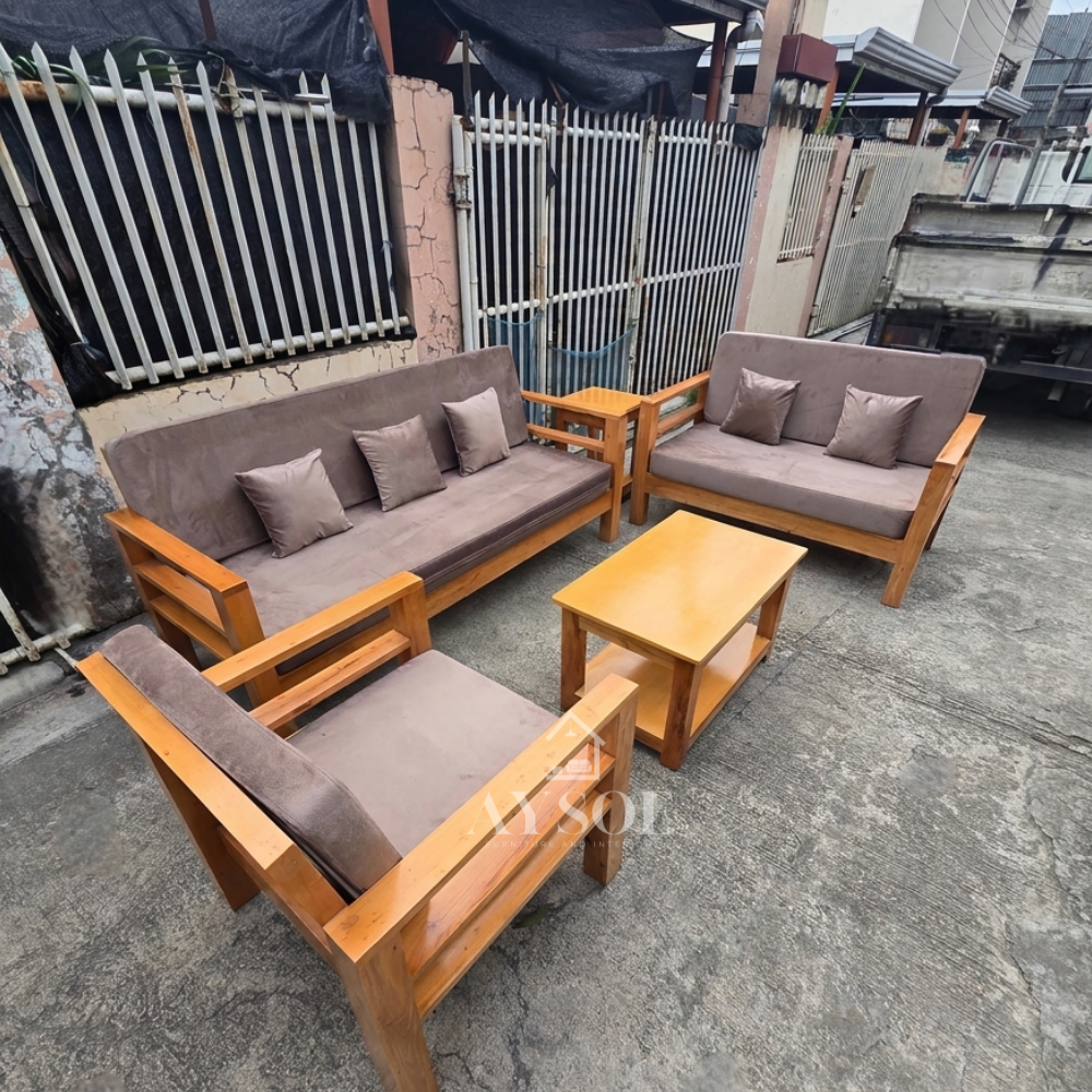 A honey-finish solid wood living set: 3-seater sofa, loveseat, armchair, coffee table, and side table, with thick mocha cushions. Sturdy, roomy, made to order.