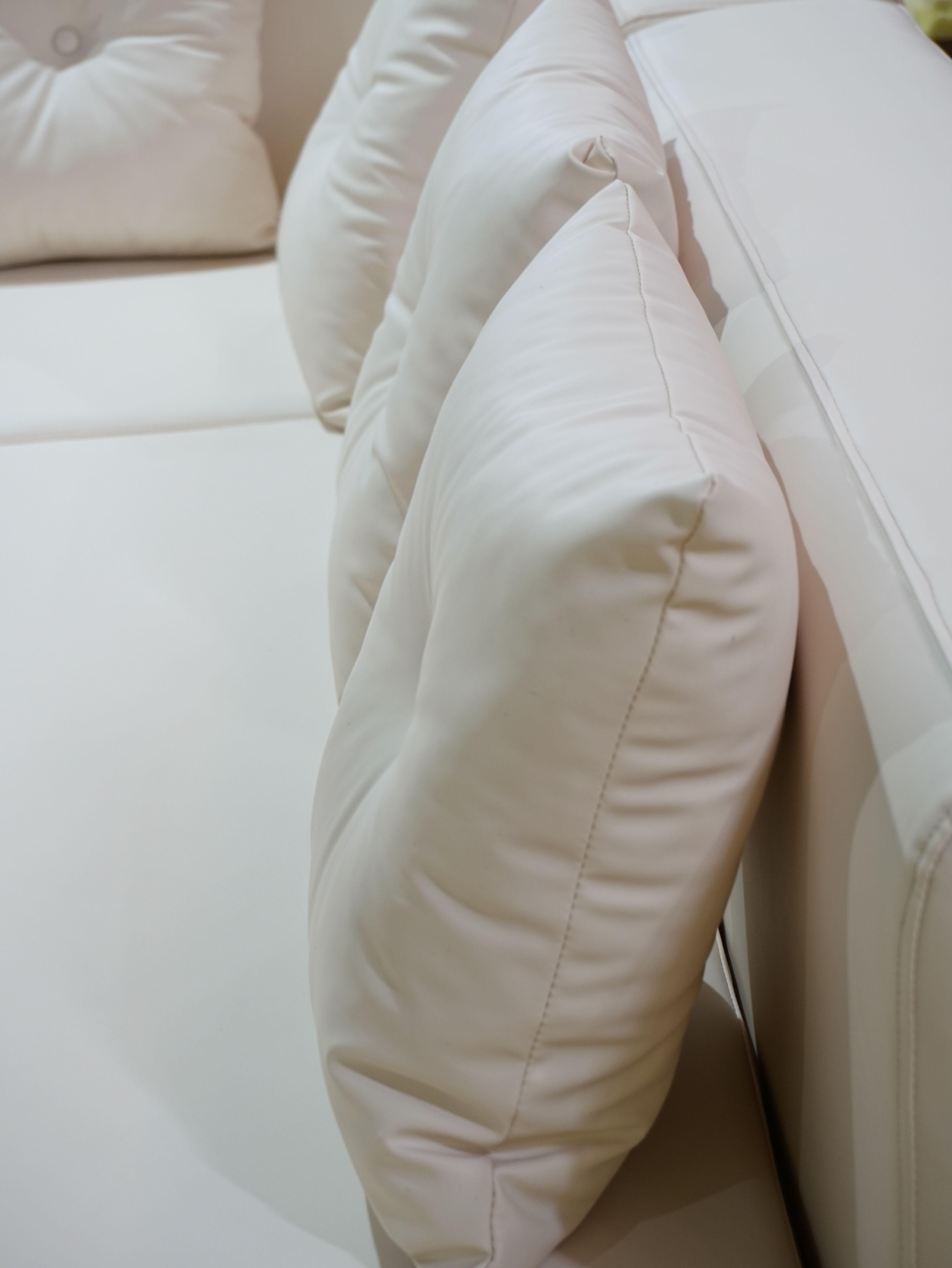 A premium leather L-shape sofa built on a kiln-dried mahogany frame, crafted for lasting comfort and refined style.