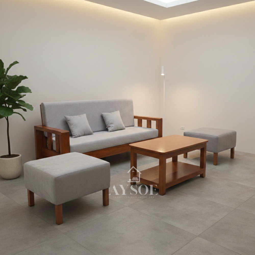 Two matching rectangular ottoman stools with grey fabric tops and wooden legs are positioned on either side of the layout.
