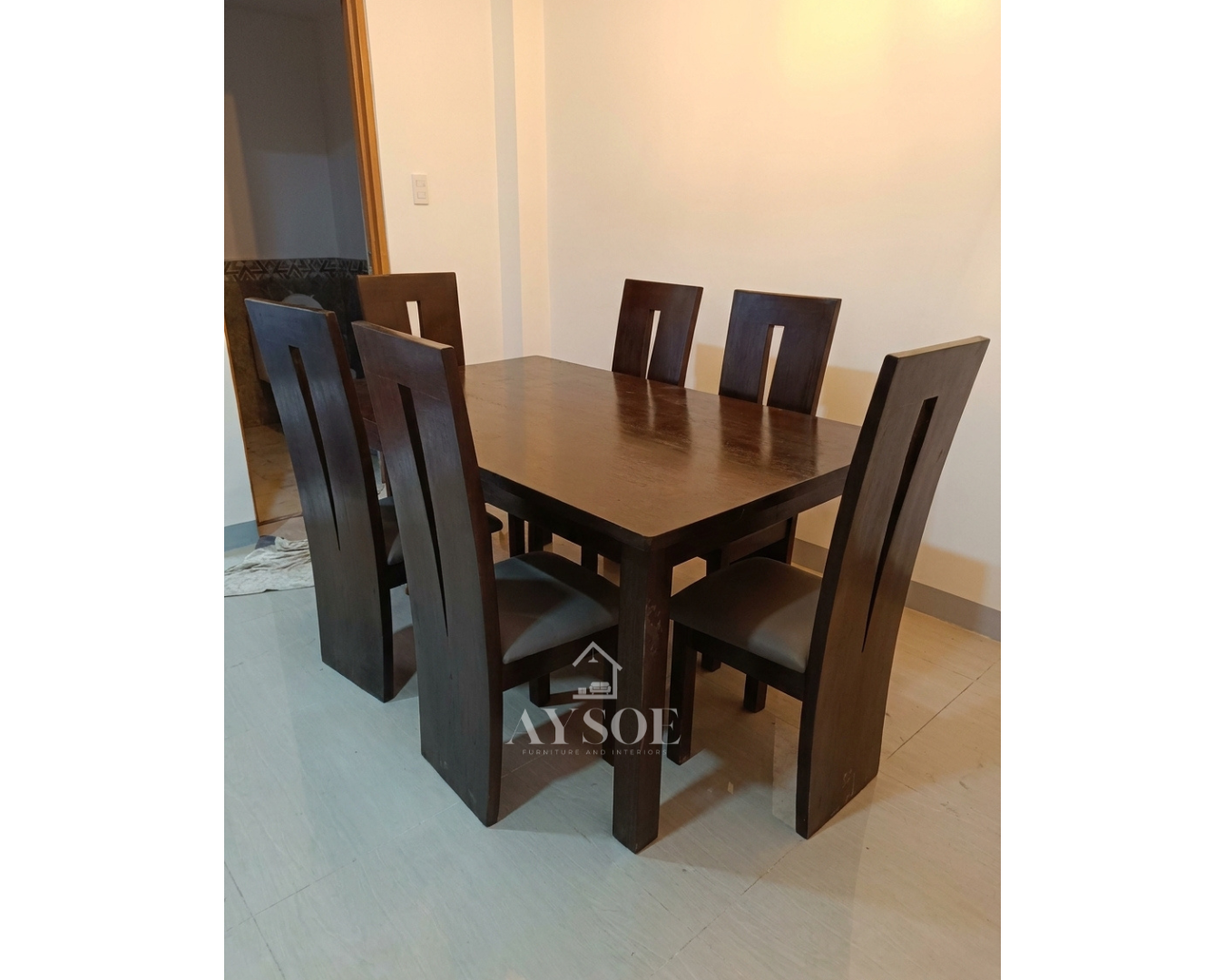 A 6-seater dining set with a solid wood rectangular table and six tall cut-out-back chairs with grey cushioned seats, in a deep espresso finish. Sturdy, wipe-clean, made to order.