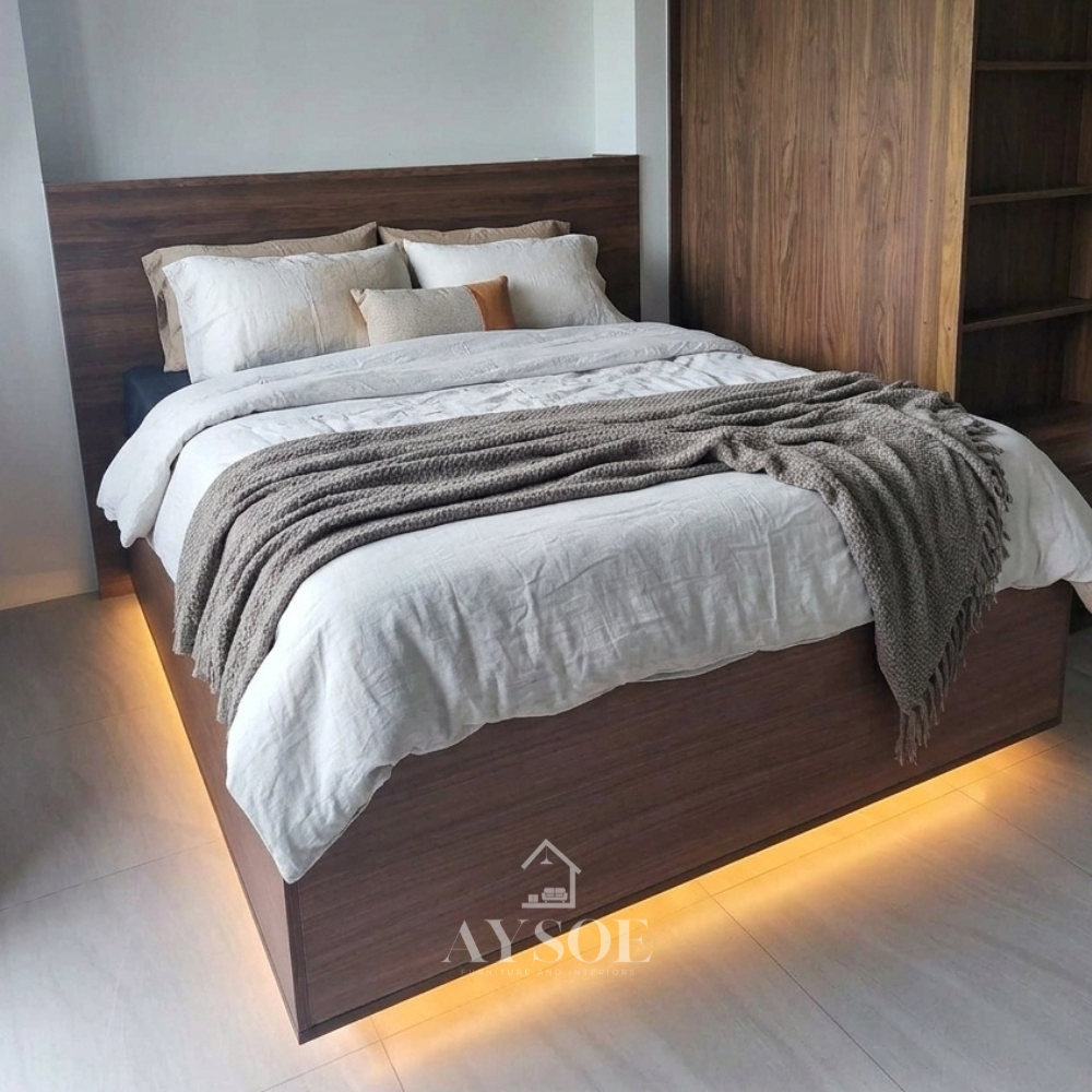 A modern walnut wood-grain platform bed that looks like it’s floating, with warm LED lighting underneath and a full-width panel headboard. Clean lines, rich grain, and a calm, hotel-style glow.
