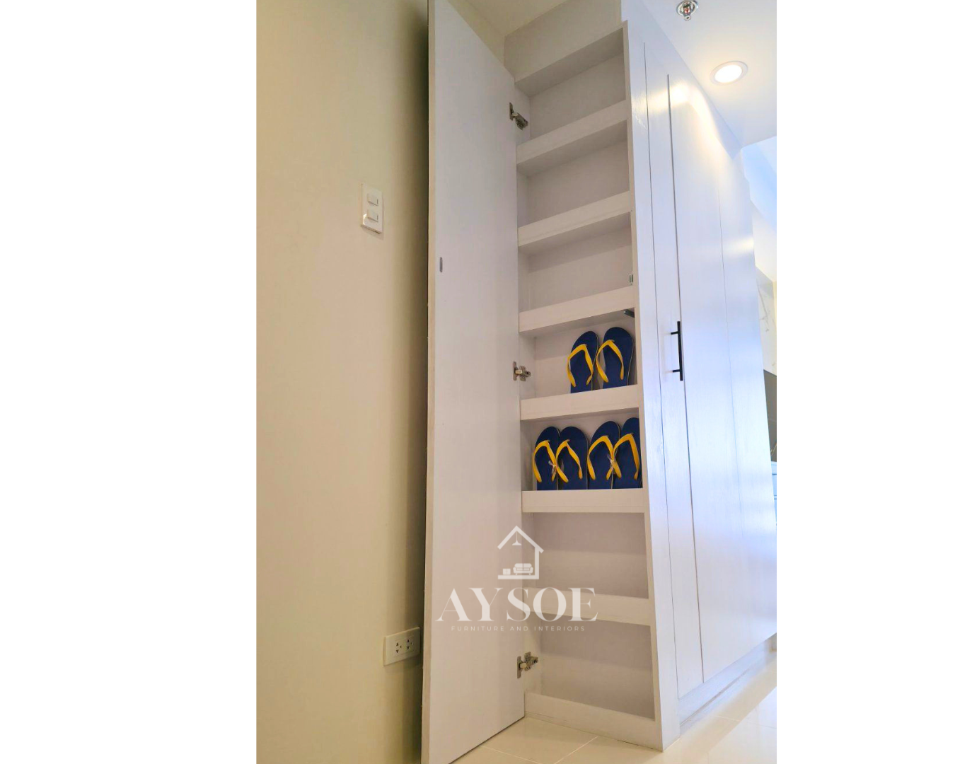 A complete custom condo set with a marble-look TV wall, floating vanity, mirror wardrobe, slim shoe cabinet, and bathroom mirror cabinet with shelves. Stylish, space-saving, and built to fit.