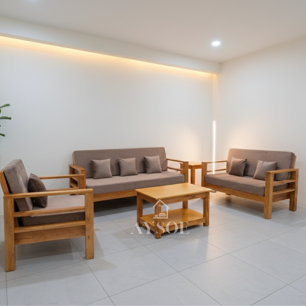 A honey-finish solid wood living set: 3-seater sofa, loveseat, armchair, coffee table, and side table, with thick mocha cushions. Sturdy, roomy, made to order.