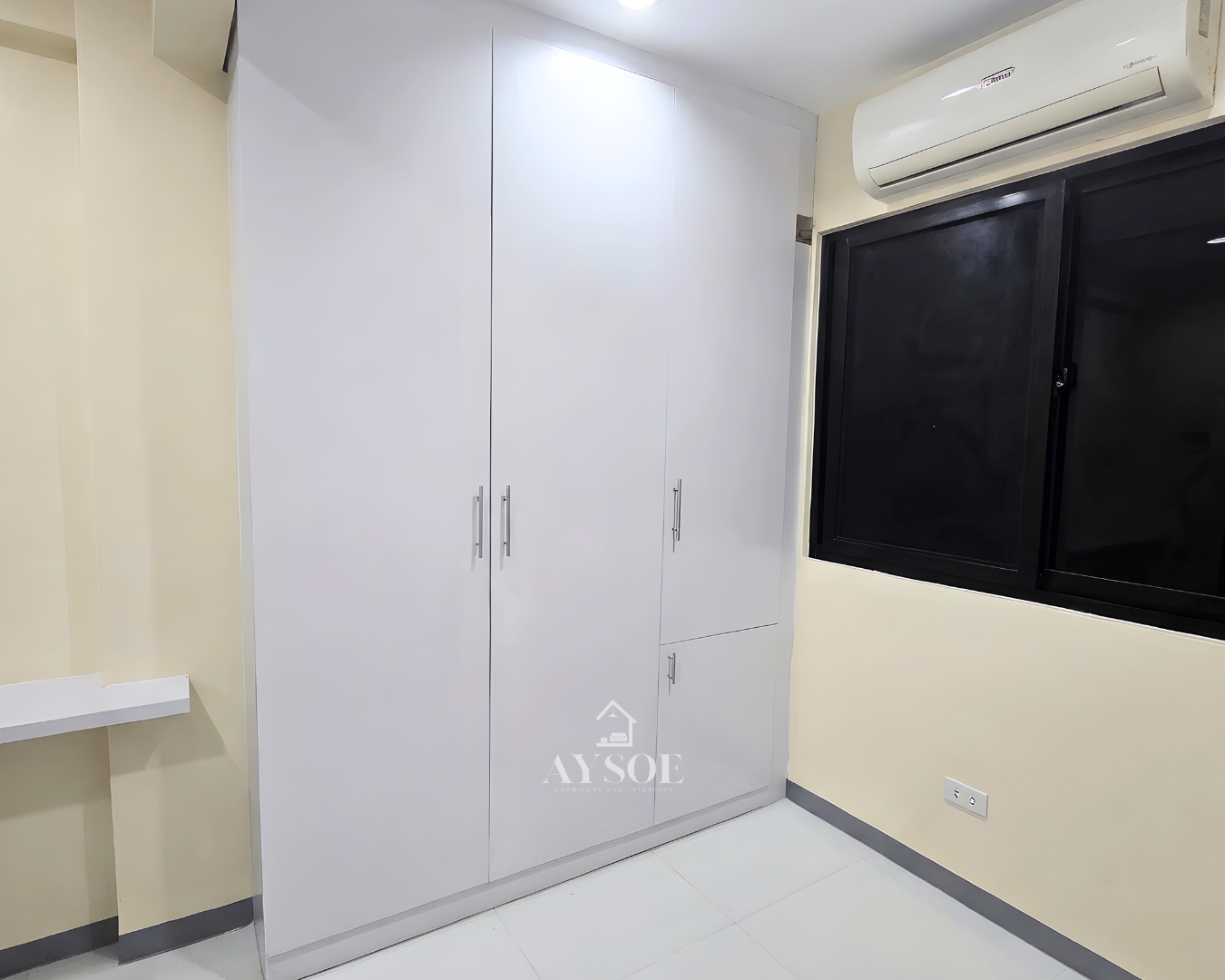 A custom white built-in wardrobe with hanging rods, open shelves, and a full-length mirror door. Roomy, organized storage for any bedroom.