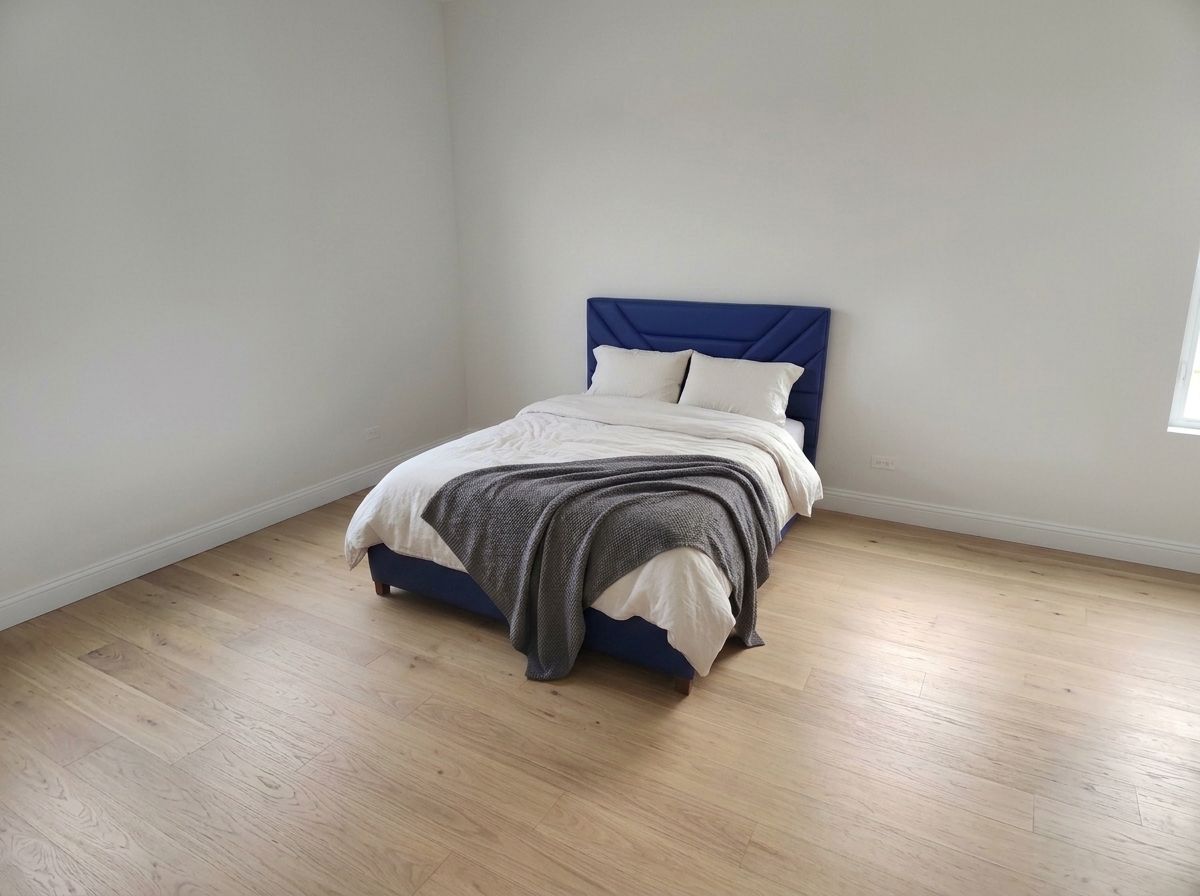 Constructed from a mahogany wood bed frame and upholstered with leatherette.