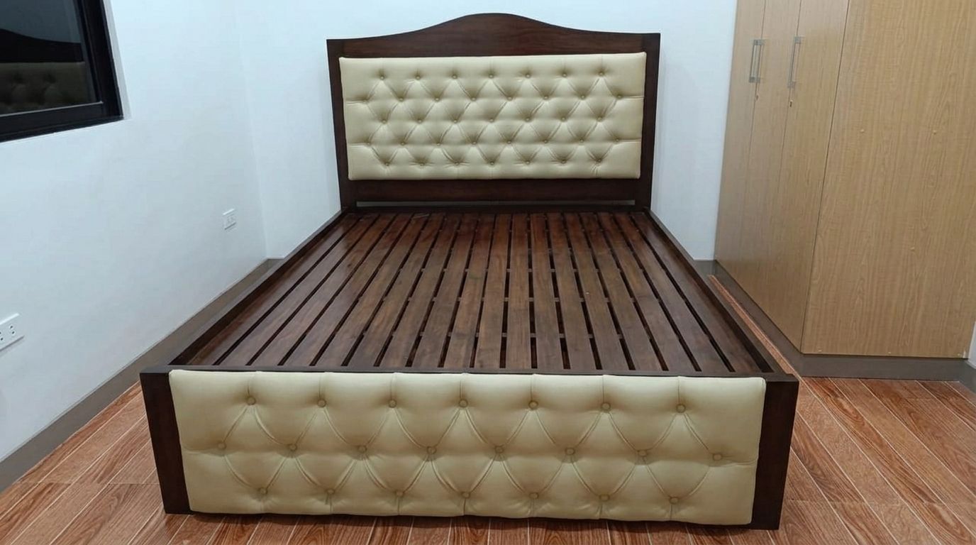 A solid wood bed in a deep walnut finish, with an arched headboard, cream button-tufted leatherette panels on the headboard and footboard, a slatted base, and built-in side drawers. Classic, warm, and practical.