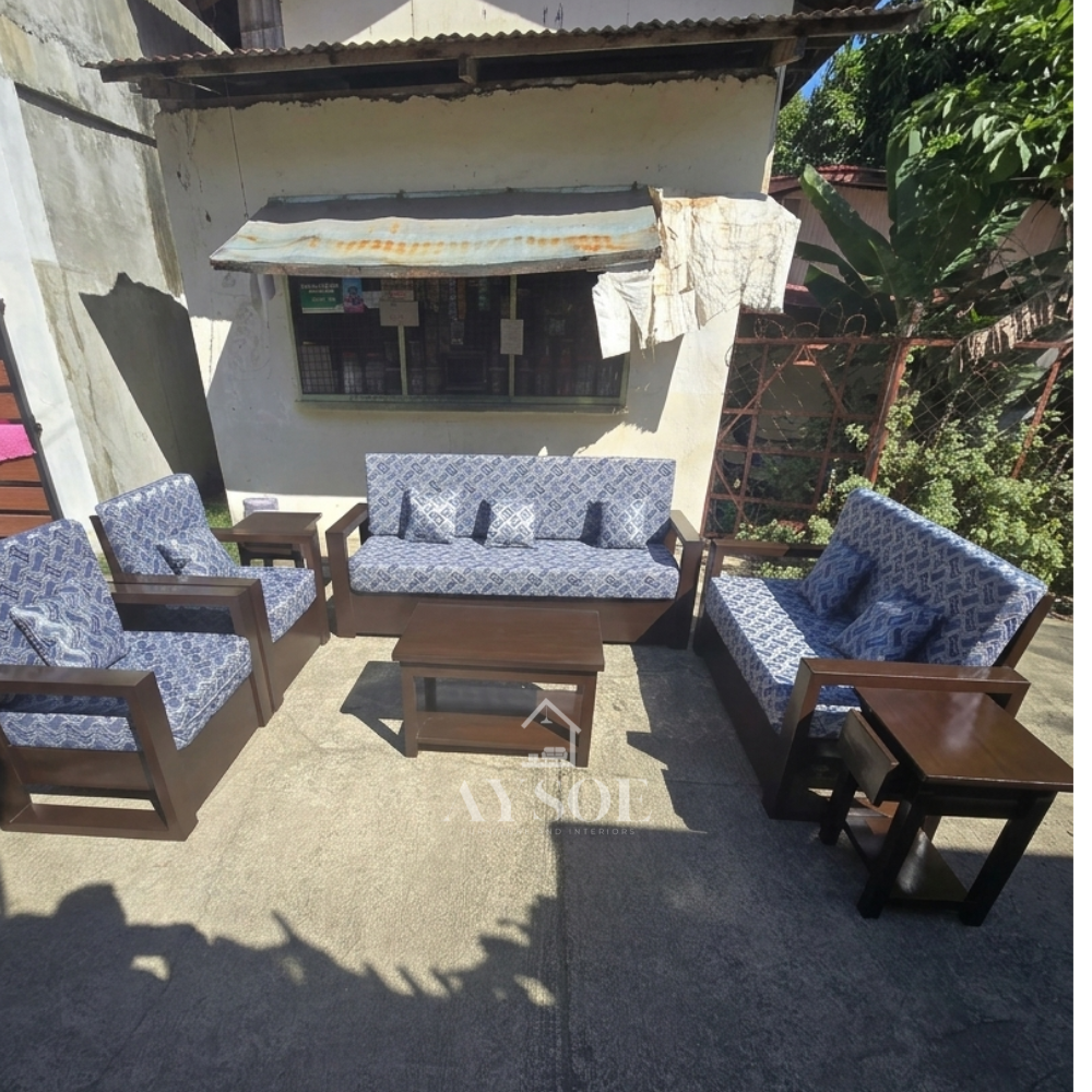 Dark walnut wood living set with blue-and-white patterned cushions: 3-seater sofa, loveseat, 2 armchairs, coffee table, and 2 side tables. Statement seating, made to order.