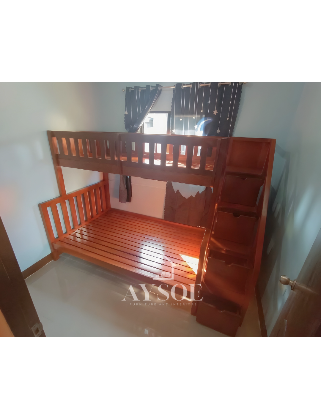 A mahogany-finish solid wood bunk bed with a single upper bunk, a wider lower bed, and a staircase with pull-out storage drawers. Sturdy and space-saving for shared rooms.