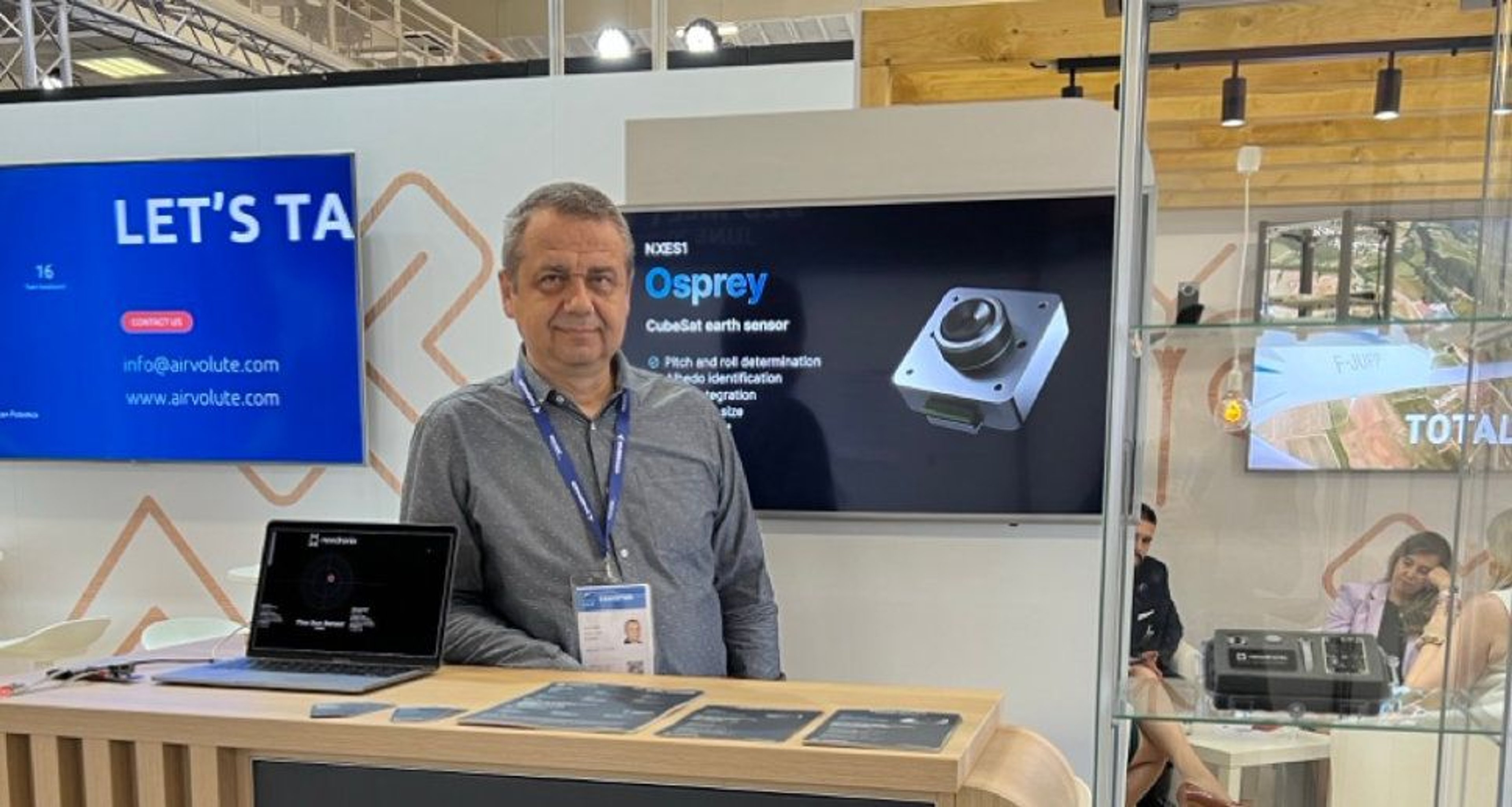 Booth of Needronix at Paris Air Show 2023 showcasing spacecraft components