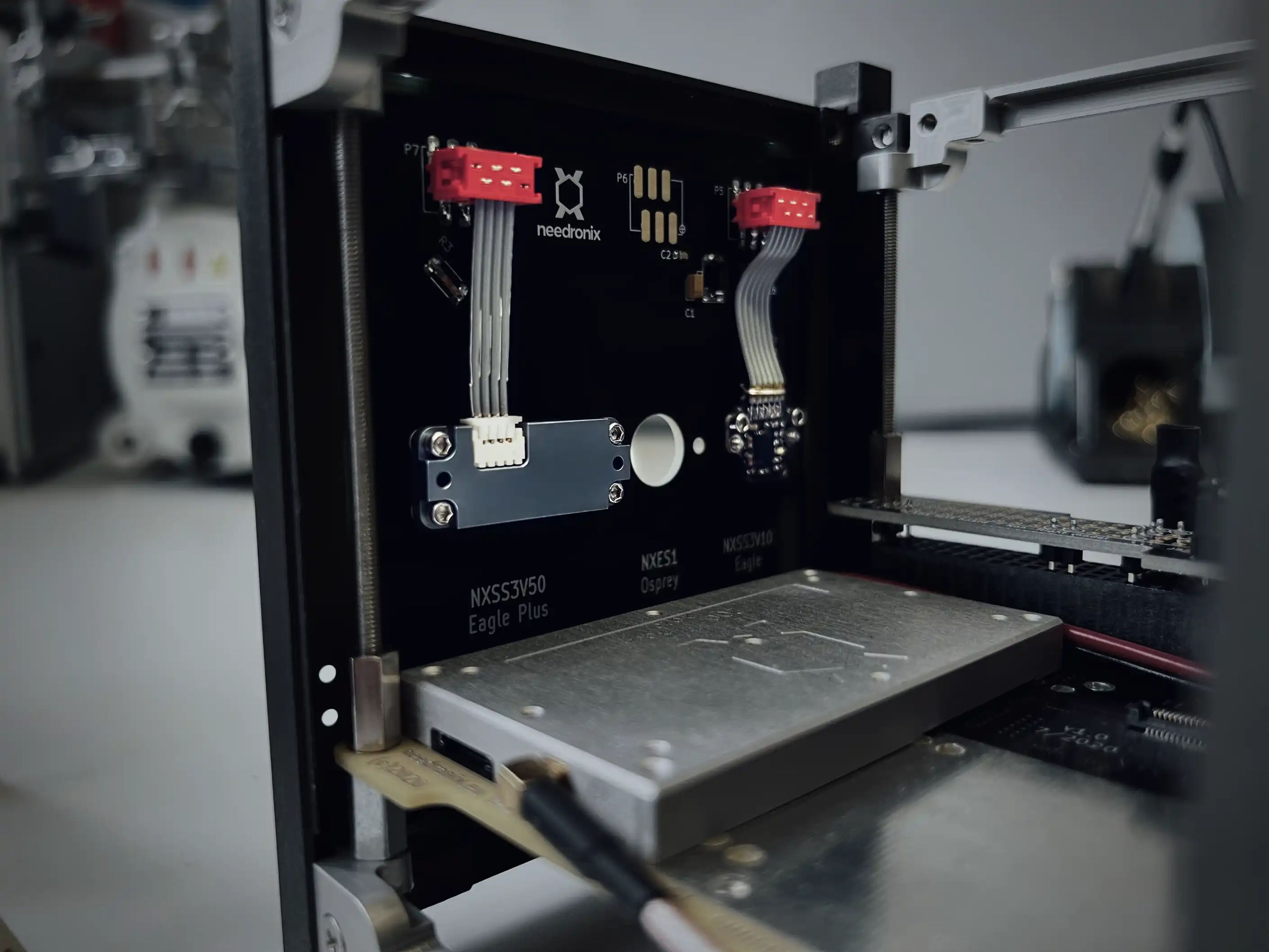 Eagle Plus and Eagle mounted inside of a demo CubeSat.