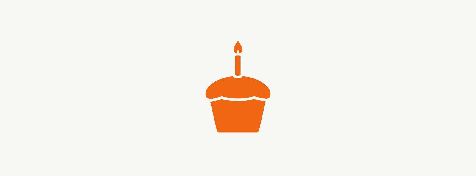 Illustration of cupcake with lit candle celebrating first anniversary