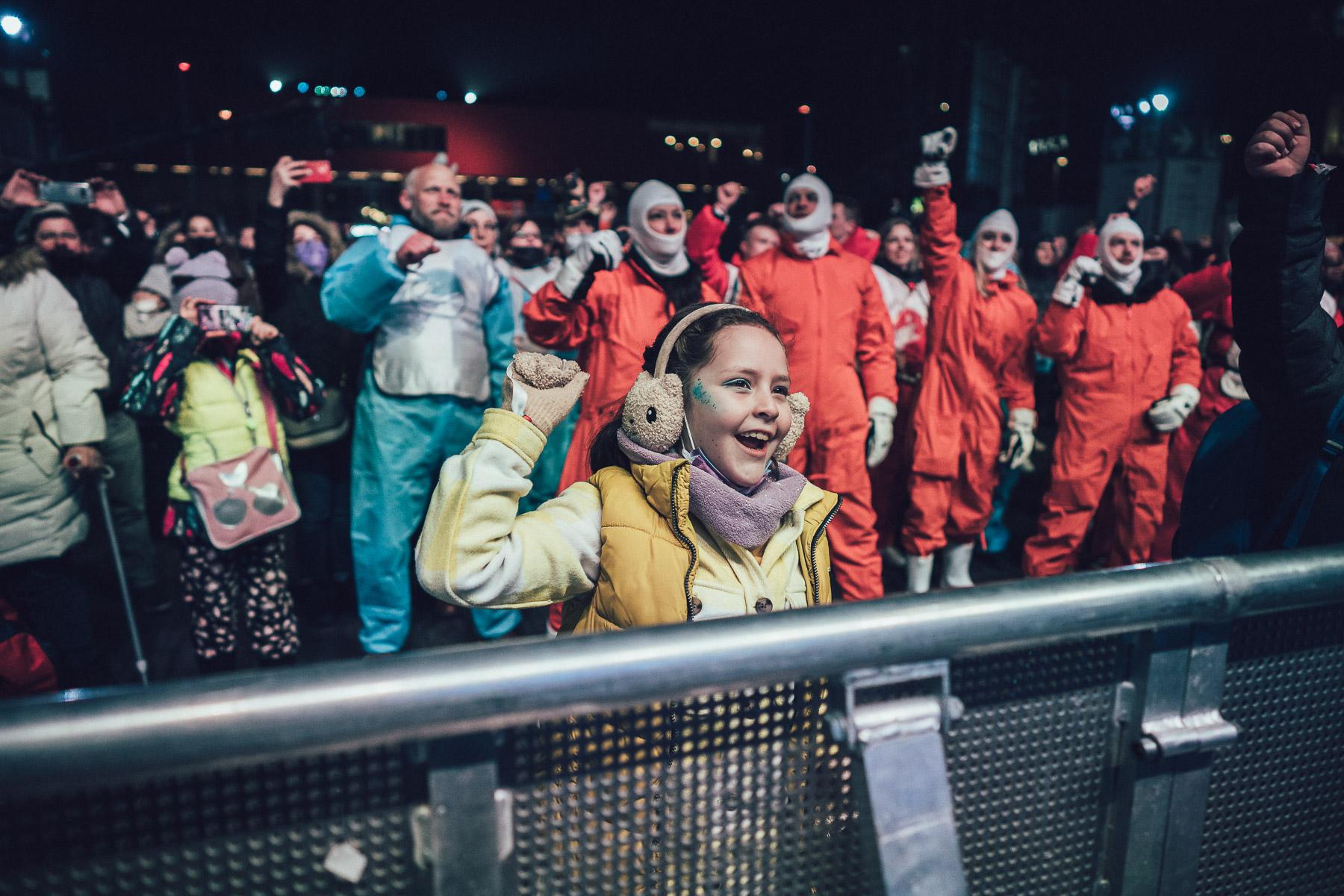 Audience members cheering in front of the stage at the opening ceremony of the European Capital of Culture Esch2022