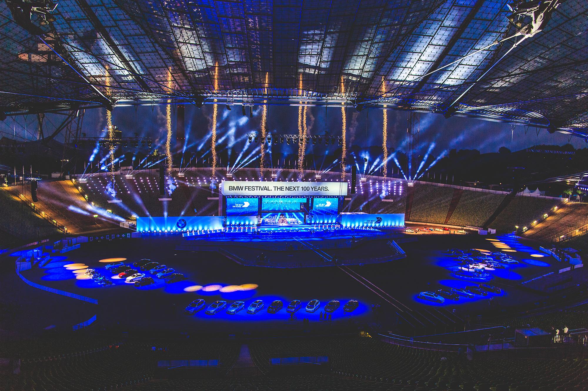 Technical rehearsal at night in a large arena.