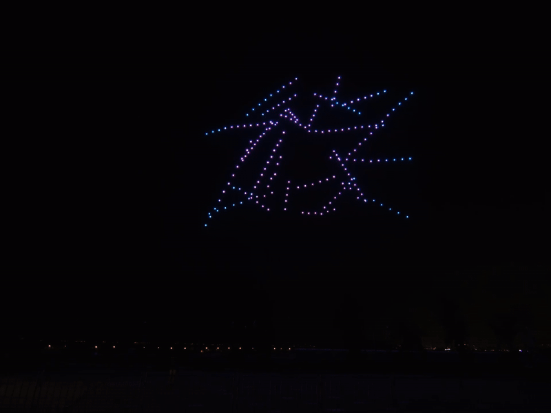 Drones that paint a virtual X in the air with lights at the Together X Event by Battle Royal Studios