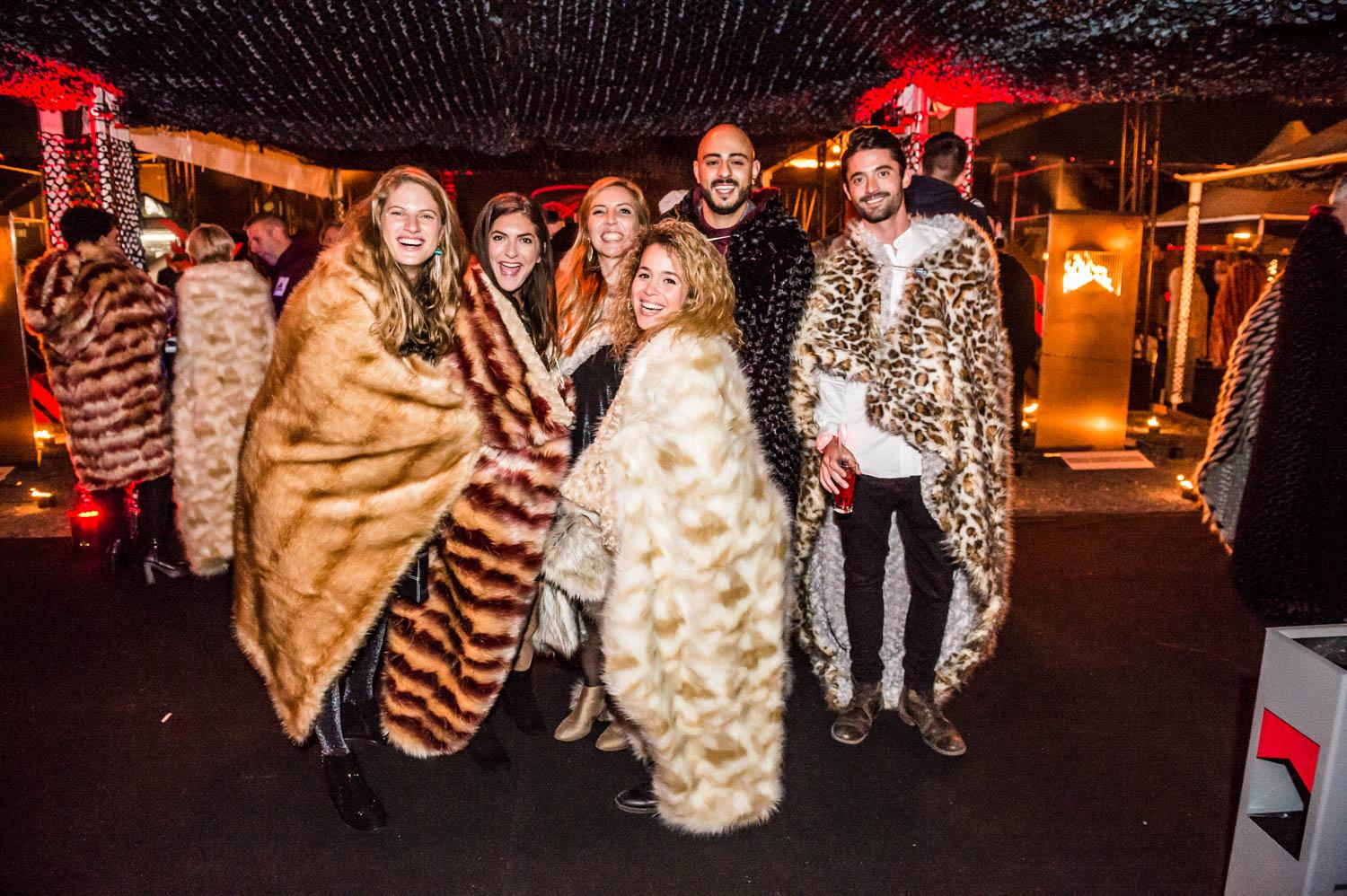 Influencers posing in fake furs as part of an immersive experience for a product launch