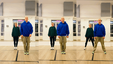 3 vertical videos are next to one another. A man in a blue hoodie and a woman in a green hoodie dance slowly, facing the camera, as if they're teaching the viewer choreography.
