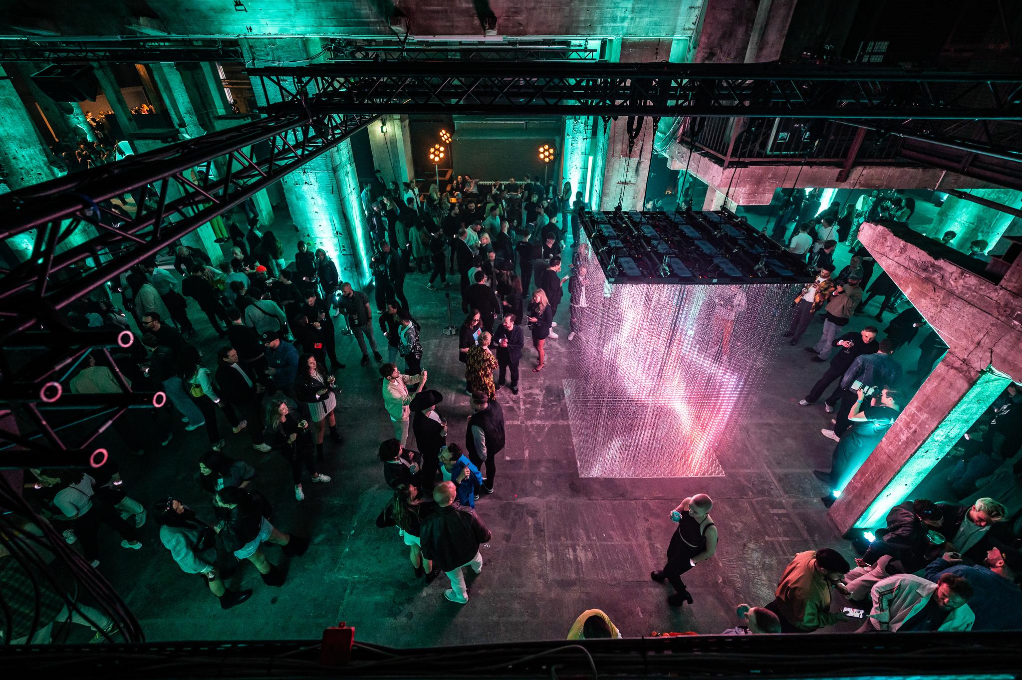 Top view of the people and immersive installations at Battle Royal Studios event for a fortune 500 client at Berlin's Kraftwerk