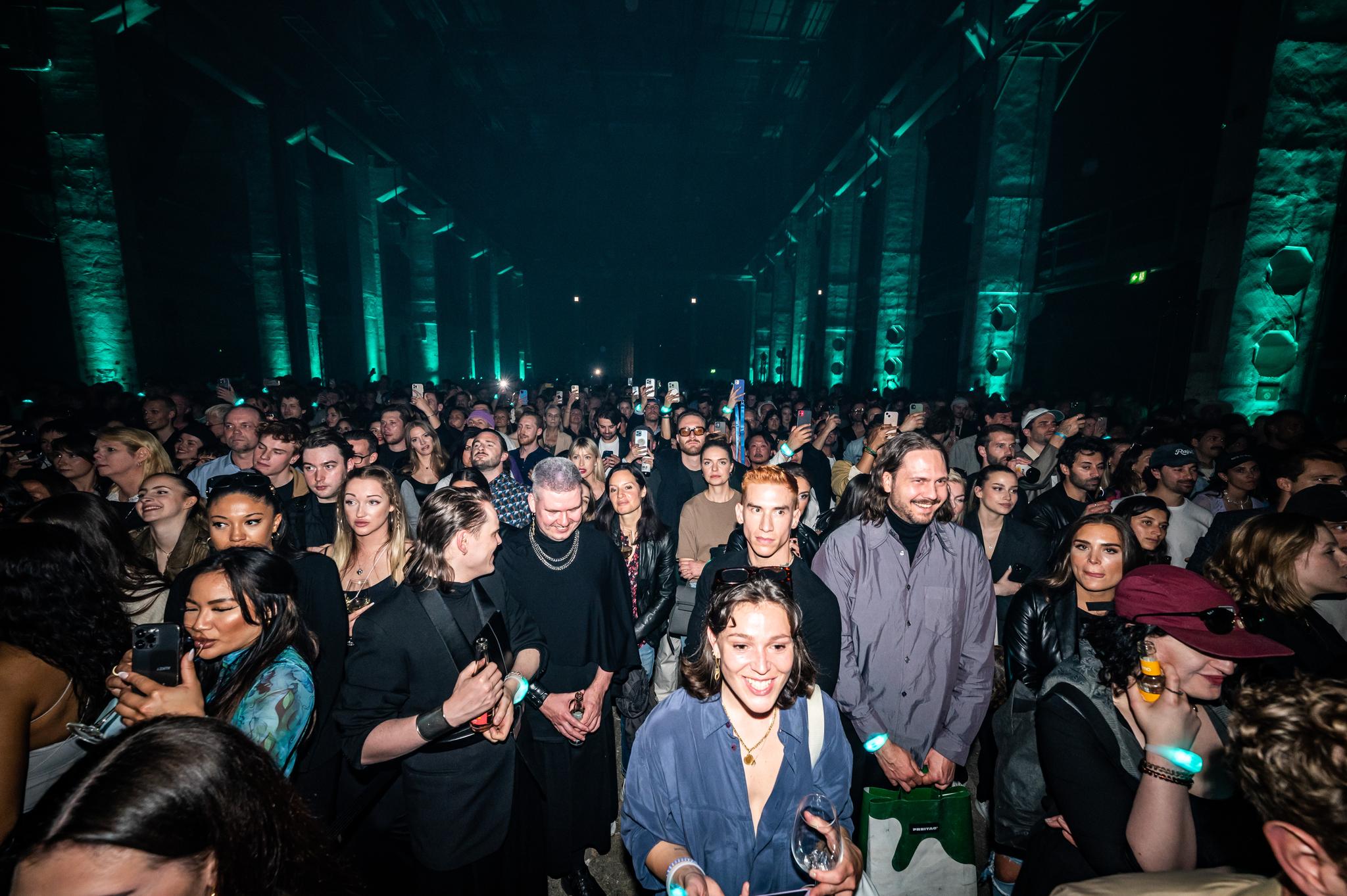 Frontal shot of Berlin's Kraftwerk filled with guests at the Battle Royal Studios event for a fortune 500 client