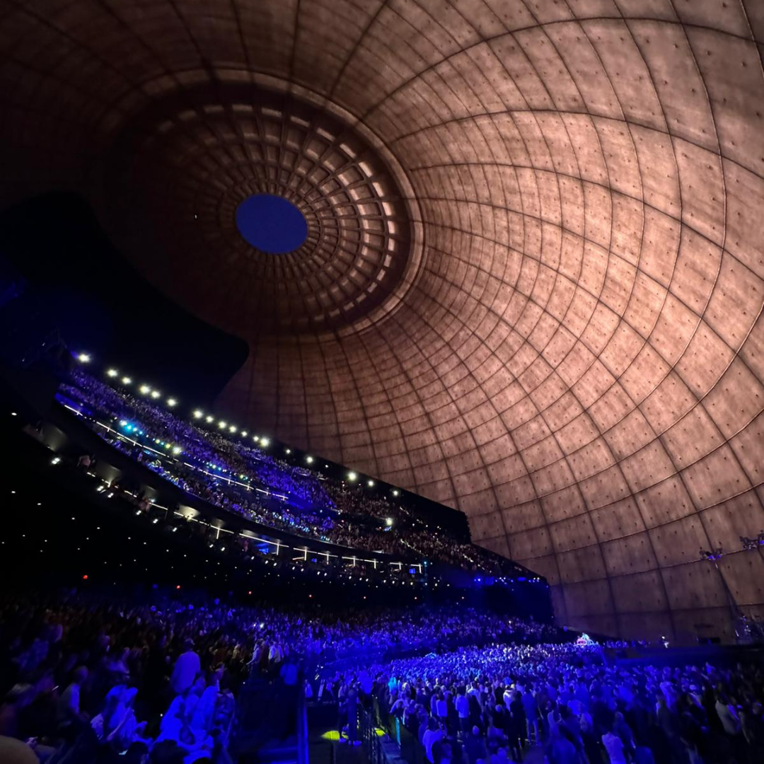 The interior of the U2Dome is illuminated and impresses spectators with dome architecture that stretches across them like a digital screen