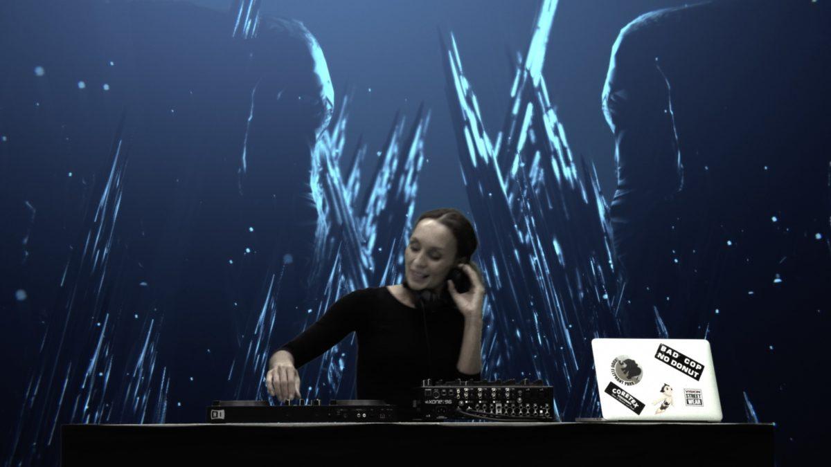 A DJ plays a set in a virtual environment.