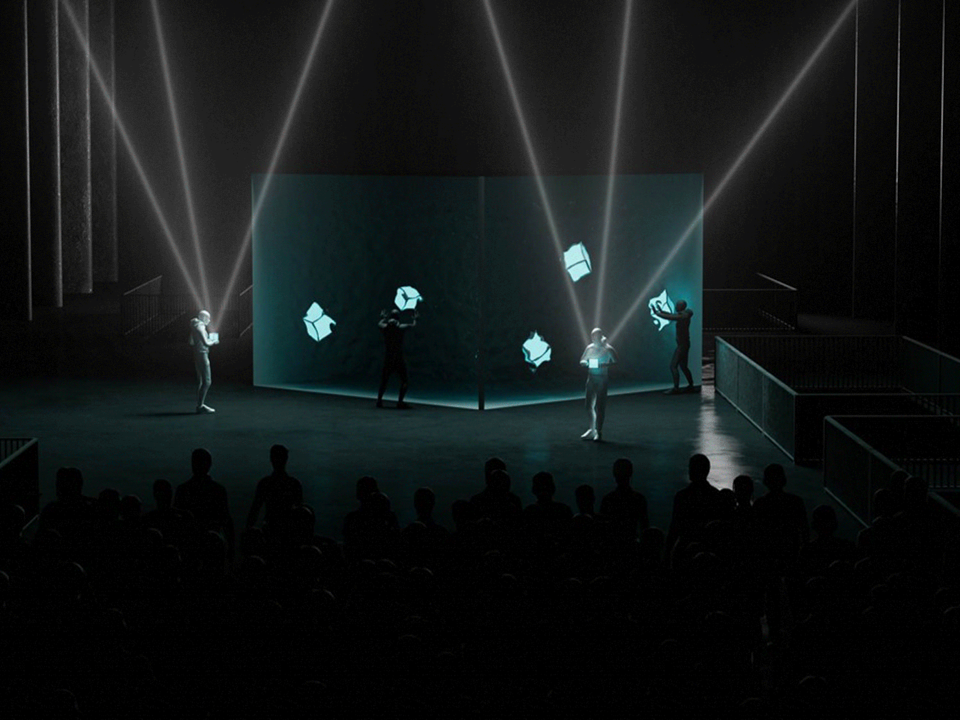 Performers dancing and holding a miniature cube in front of the massive projected cube in Berlin's Kraftwerk at the Battle Royal Studios event for a fortune 500 client