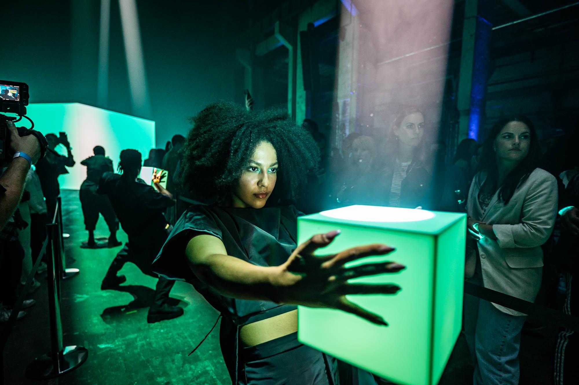 Shots of singular performers holding a cube of light with audiences surrounding them at the Battle Royal Studios event for a fortune 500 client at Berlin's Kraftwerkat the Battle Royal Studios event for a fortune 500 client at Berlin's Kraftwerk