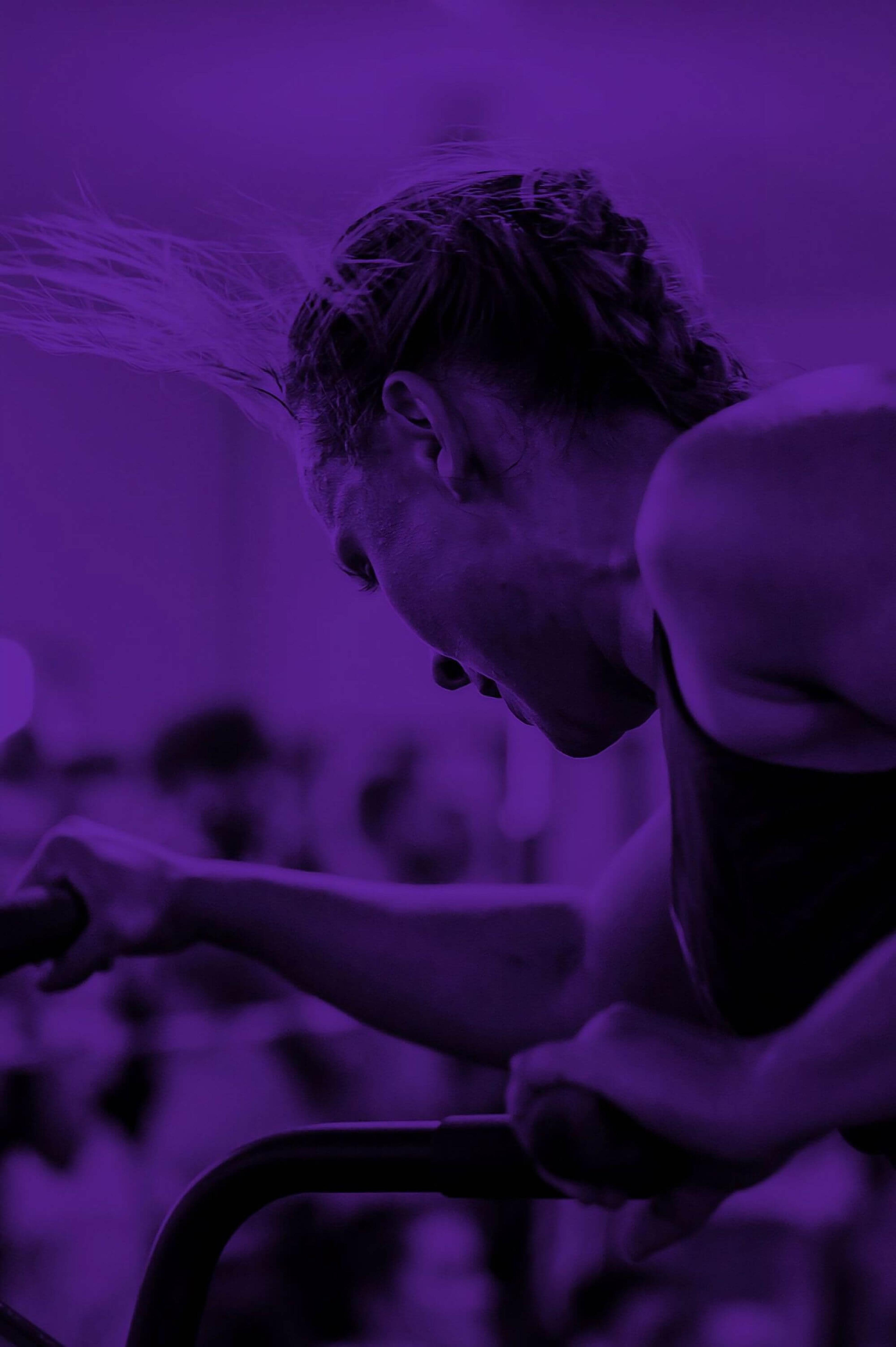 A woman doing a fitness routine, with a purple overlay