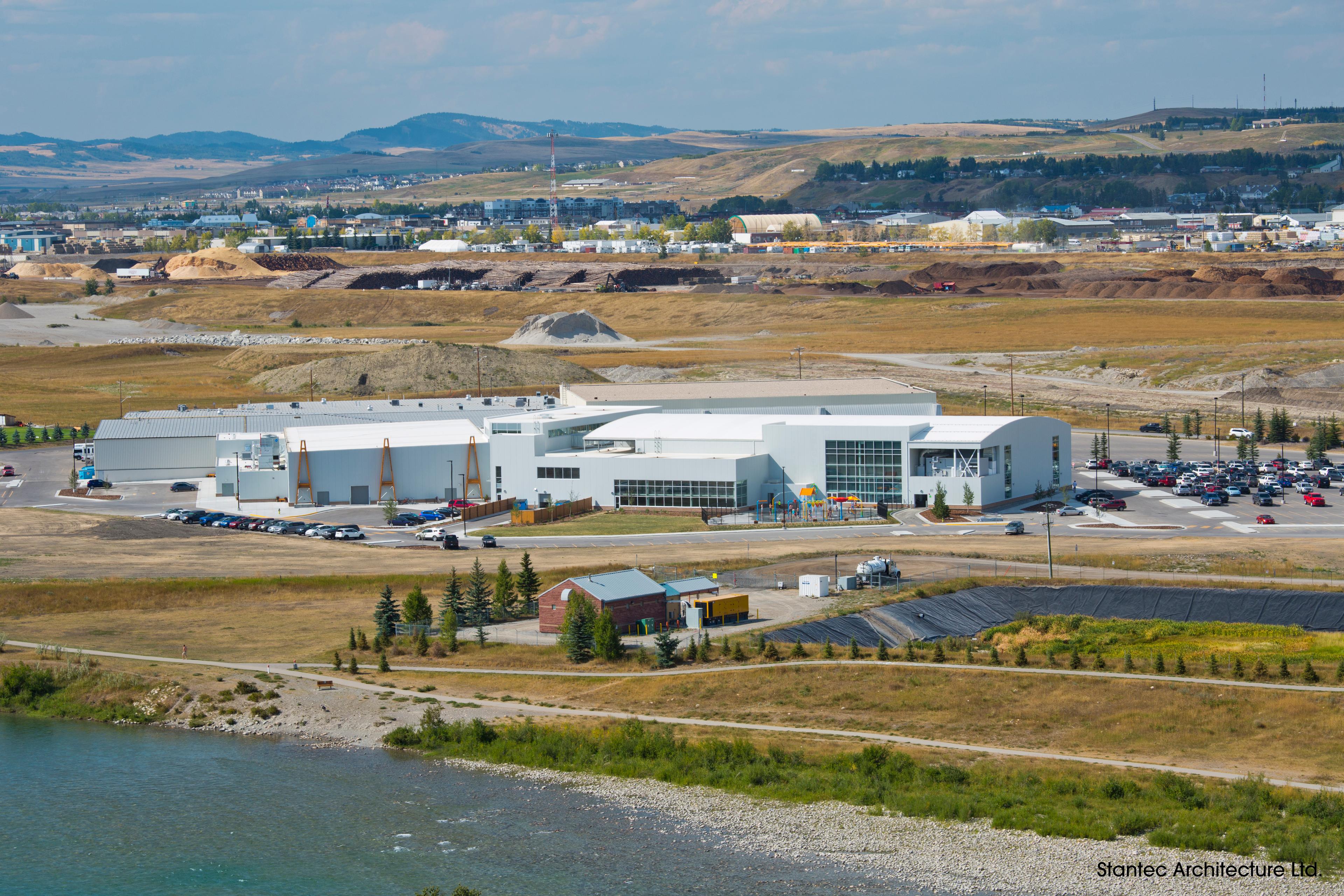 Long distance exterior photography showing the SLS Centre, outdoor play area and packing lots.