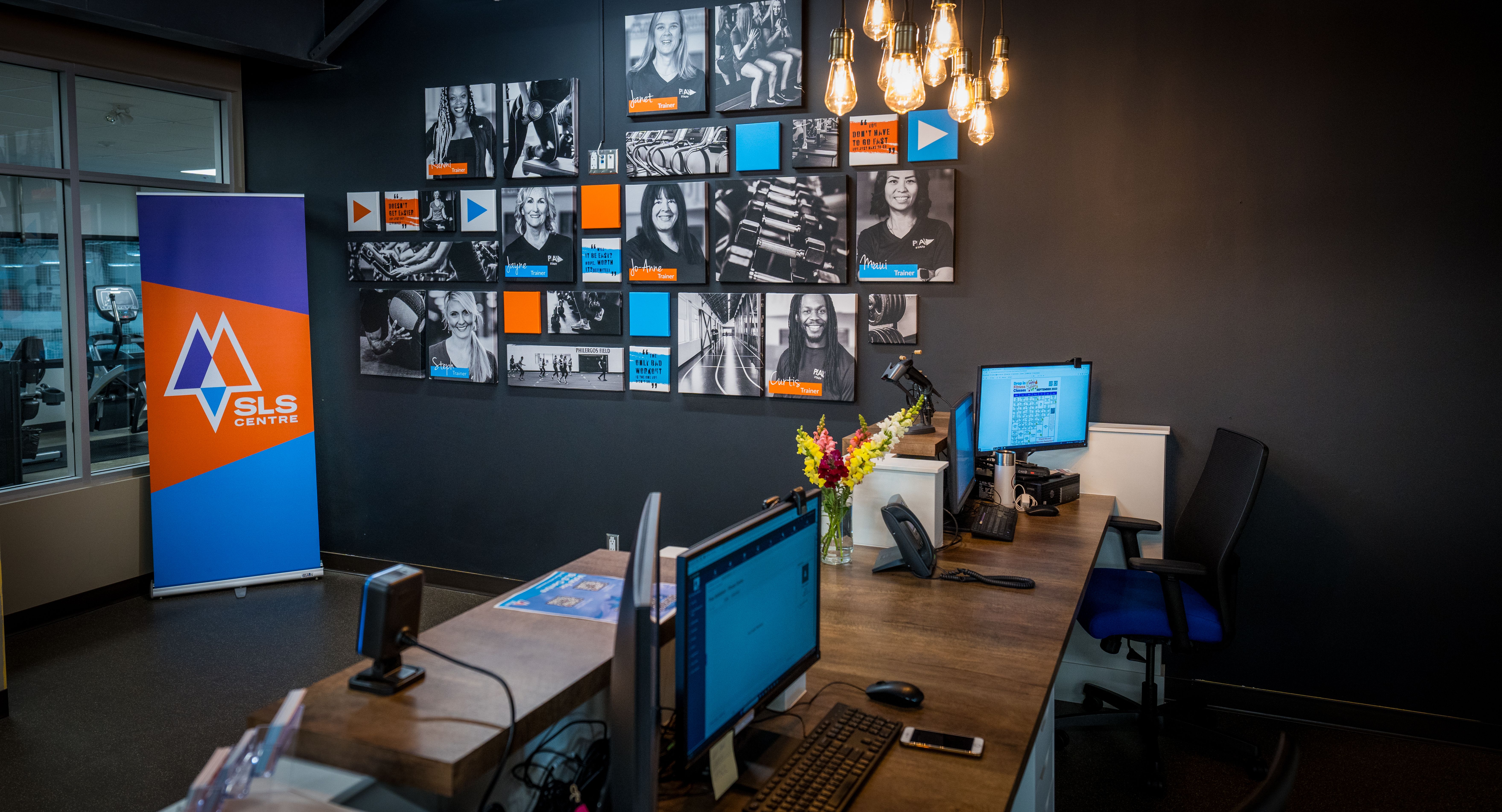 Image of a reception desk in the SLS Centre fitness centre