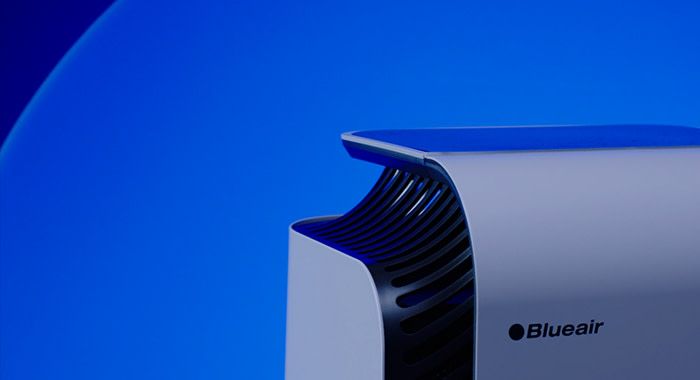 A shot of the top right corner of a blue air purifier