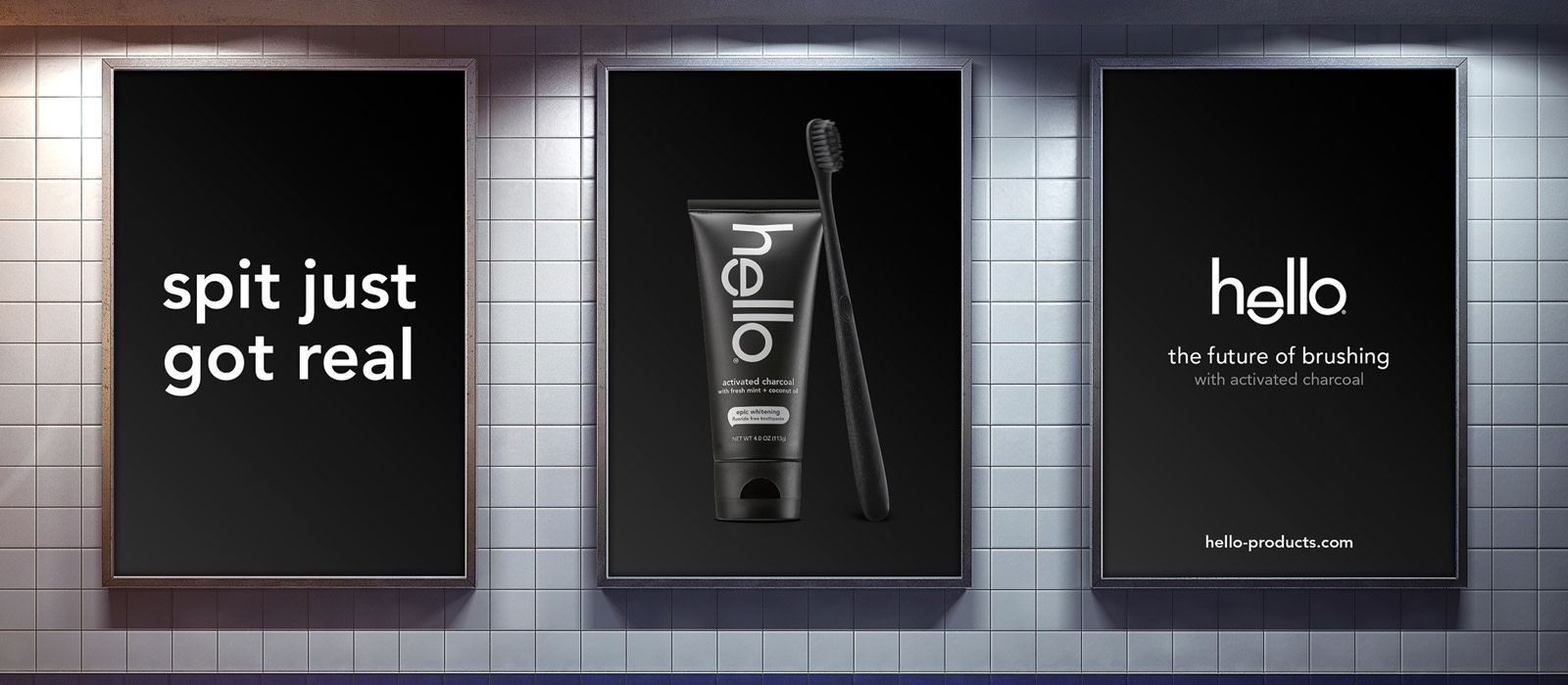 Three black hello posters advertising toothpaste and toothbrushes with the words, "Spit just got real"