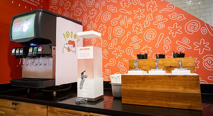 the fountain drinks and water station of holy chicken in new york