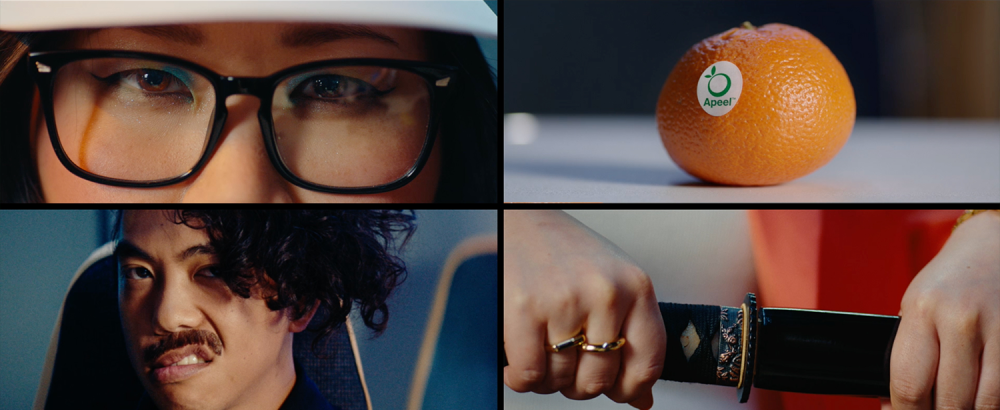 Grid of four photos of a woman's eyes, an orange, a man sneering, and a close up shot of a hand unsheathing a samurai sword