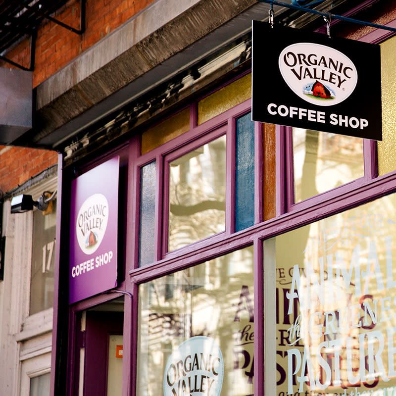 the outside of an Organic Valley Coffee shop in new york city