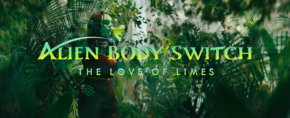 alien drinks our of a glass in forest surrounded by foliage and text displays, "Alien Body Switch the love of limes"