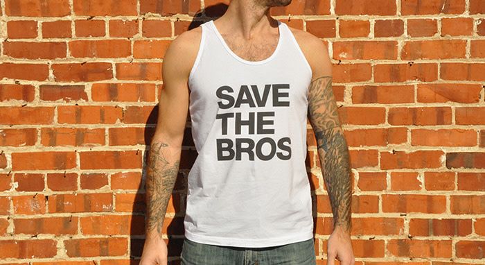 a muscular man with tattoos wears a tank top that says, "save the bros"