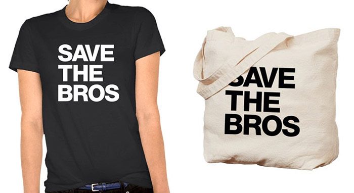 model wears a black t shirt and to the right is a tote bag both with the words, "save the bros"