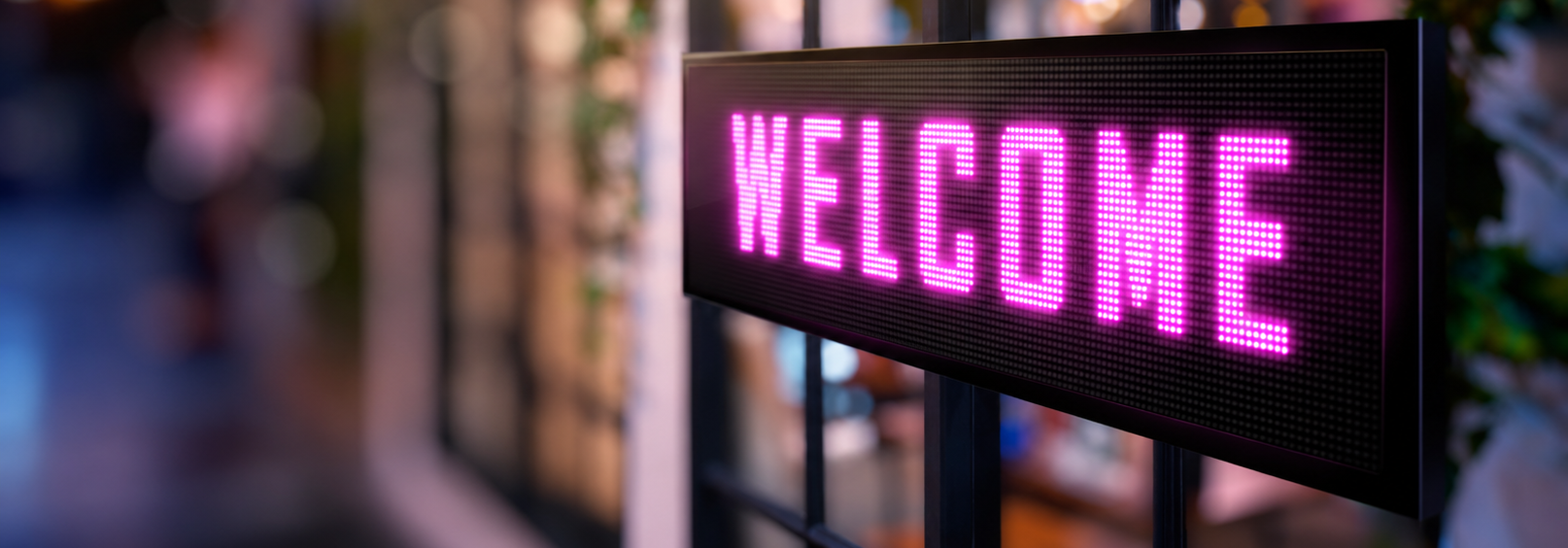 LED Matrix sign displaying the message Welcome
