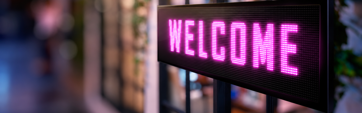 LED Matrix sign displaying the message Welcome