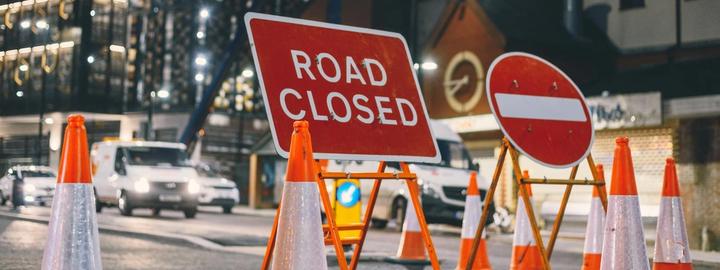A road closed sign at a road works site