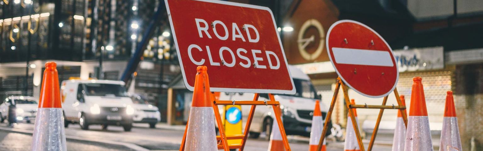 A road closed sign at a road works site