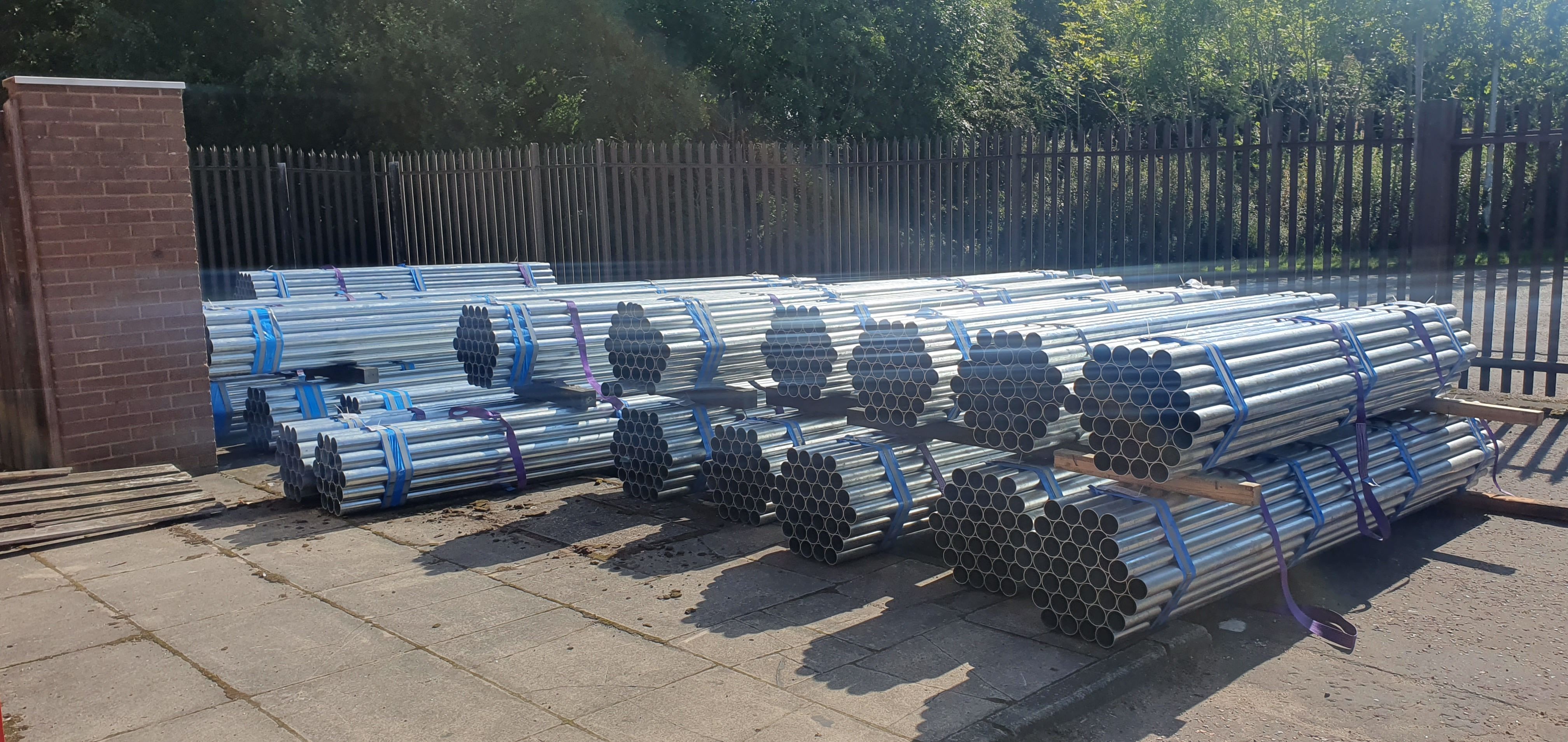 Bundles of road sign posts at the stockist storage yard