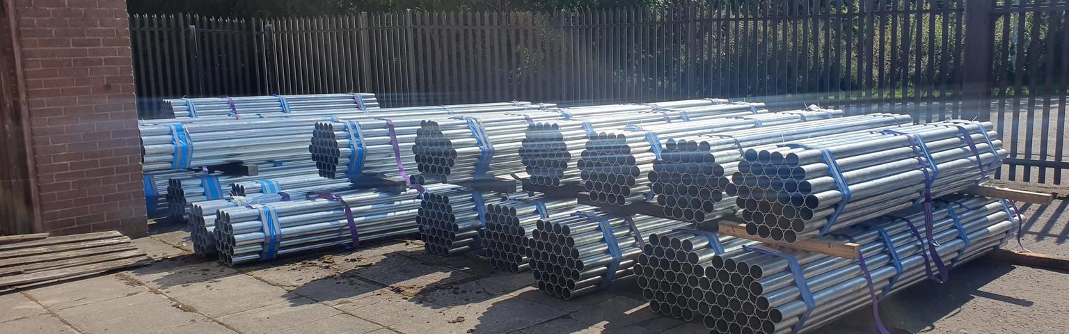 Bundles of road sign posts at the stockist storage yard